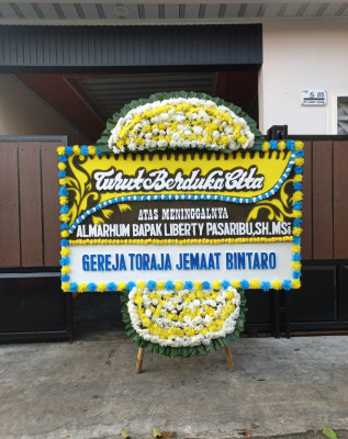Papan Bunga Duka di Sabaru